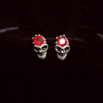 Bold Red Diamond Silver Skull Stud Earrings - Image 2